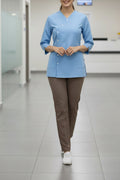 Tenue de bloc AURA croisé avec bouton pressé